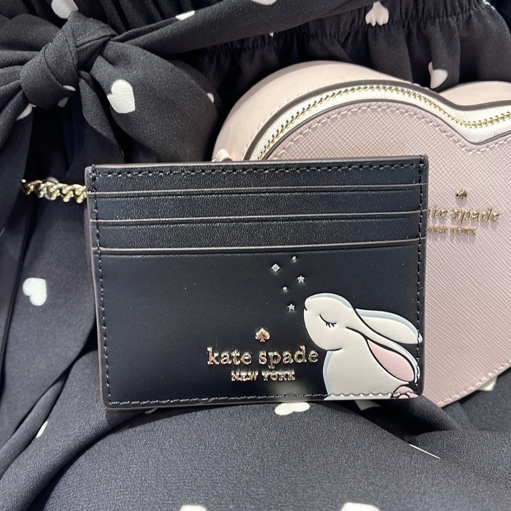 Kate Spade Bunbun Bunny Small Slim Card Holder Wallet

COLOR:
Black Multi
NWT - Picture 15 of 16